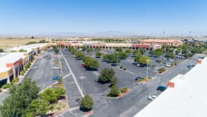 parking area of shopping center with retail/office units for lease in Lancaster, CA