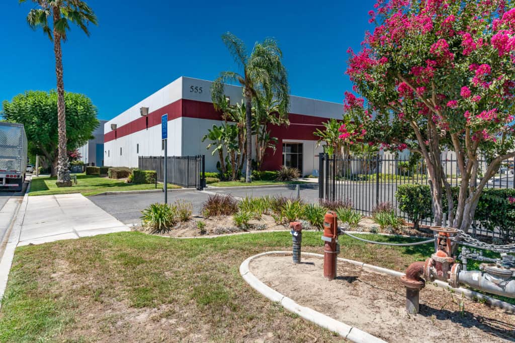 gated parking lot at building for sale in riverside, ca